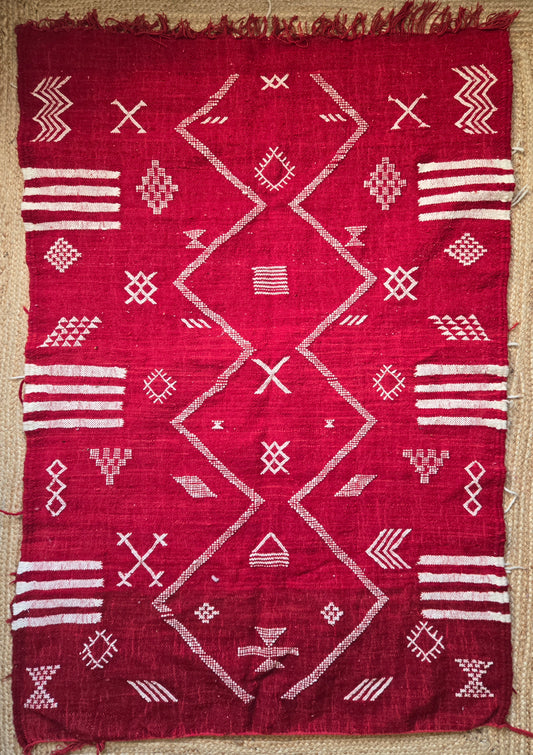 Handgefertigter roter Teppich