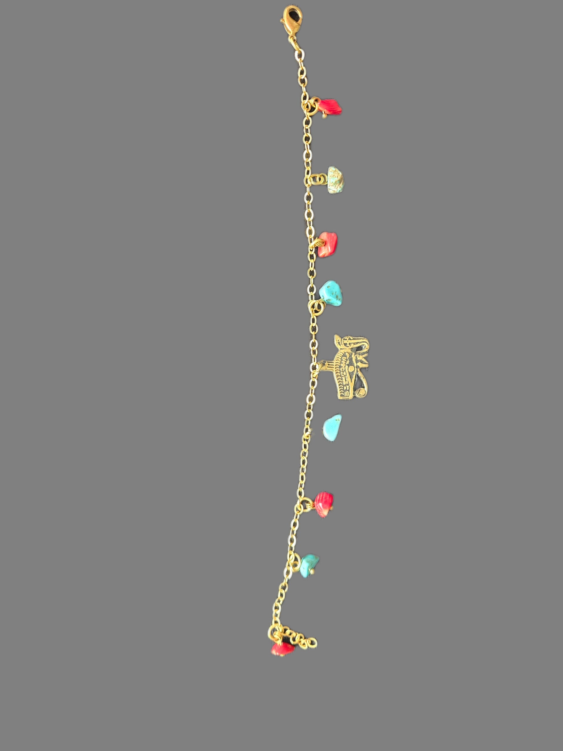 Kupferarmband mit Auge des Horus und türkisen Steinen